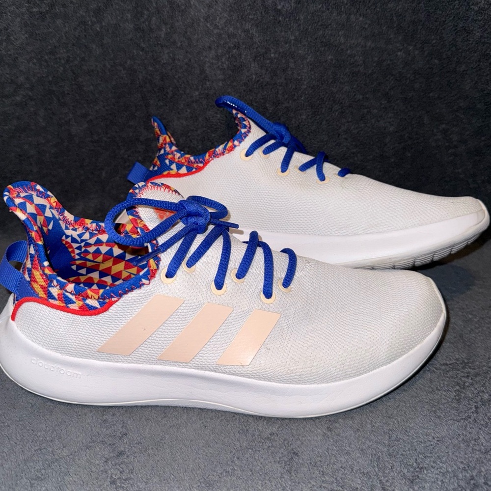 Cloudfoam Pure SPW Shoes
Size 9
Color Cloud White / Bliss Orange / Bright Red